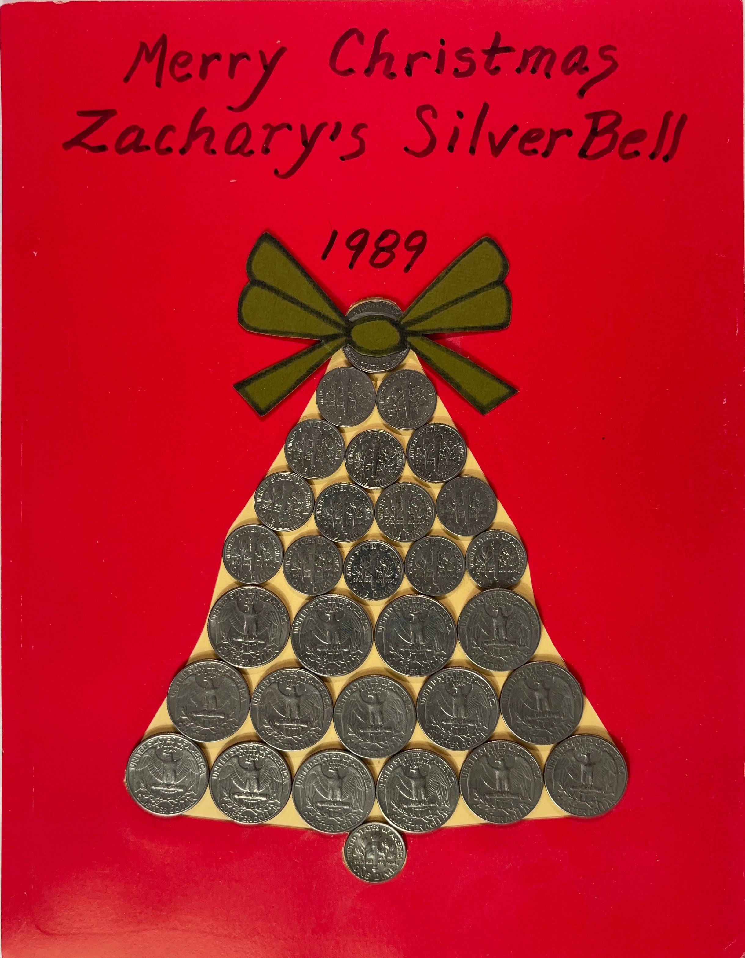 A silver bell made of US Coins