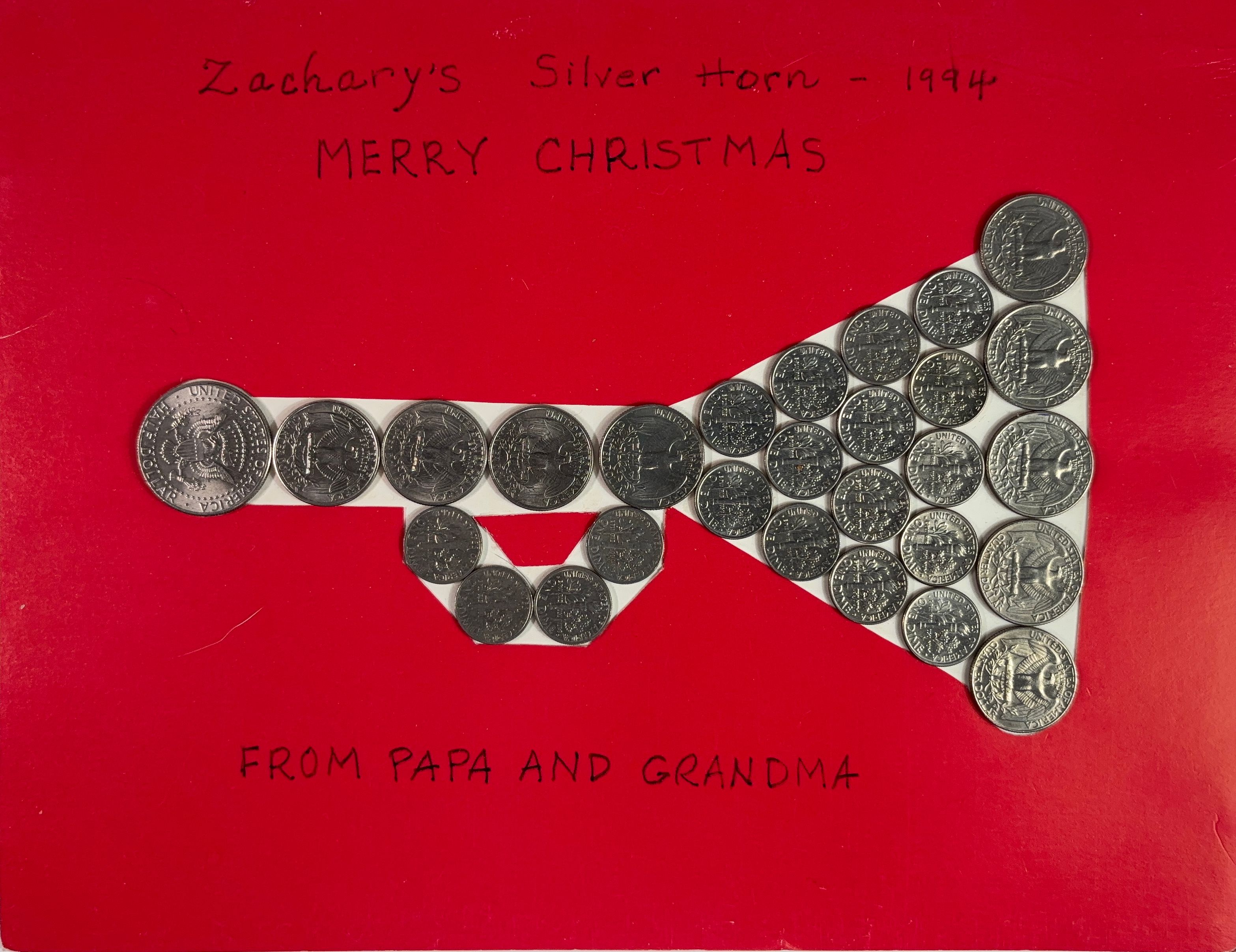 A silver horn made of US Coins