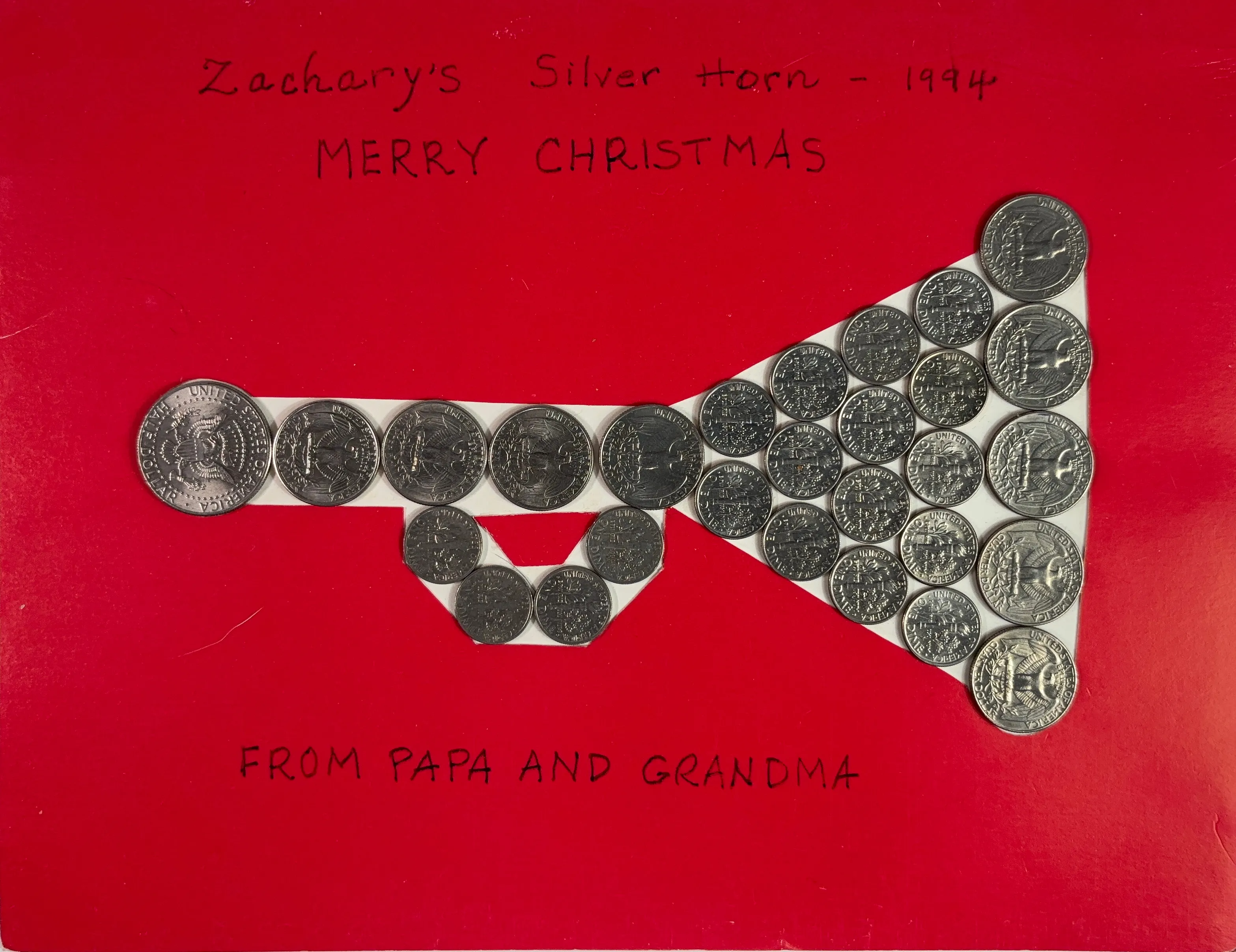 A silver horn made of US Coins