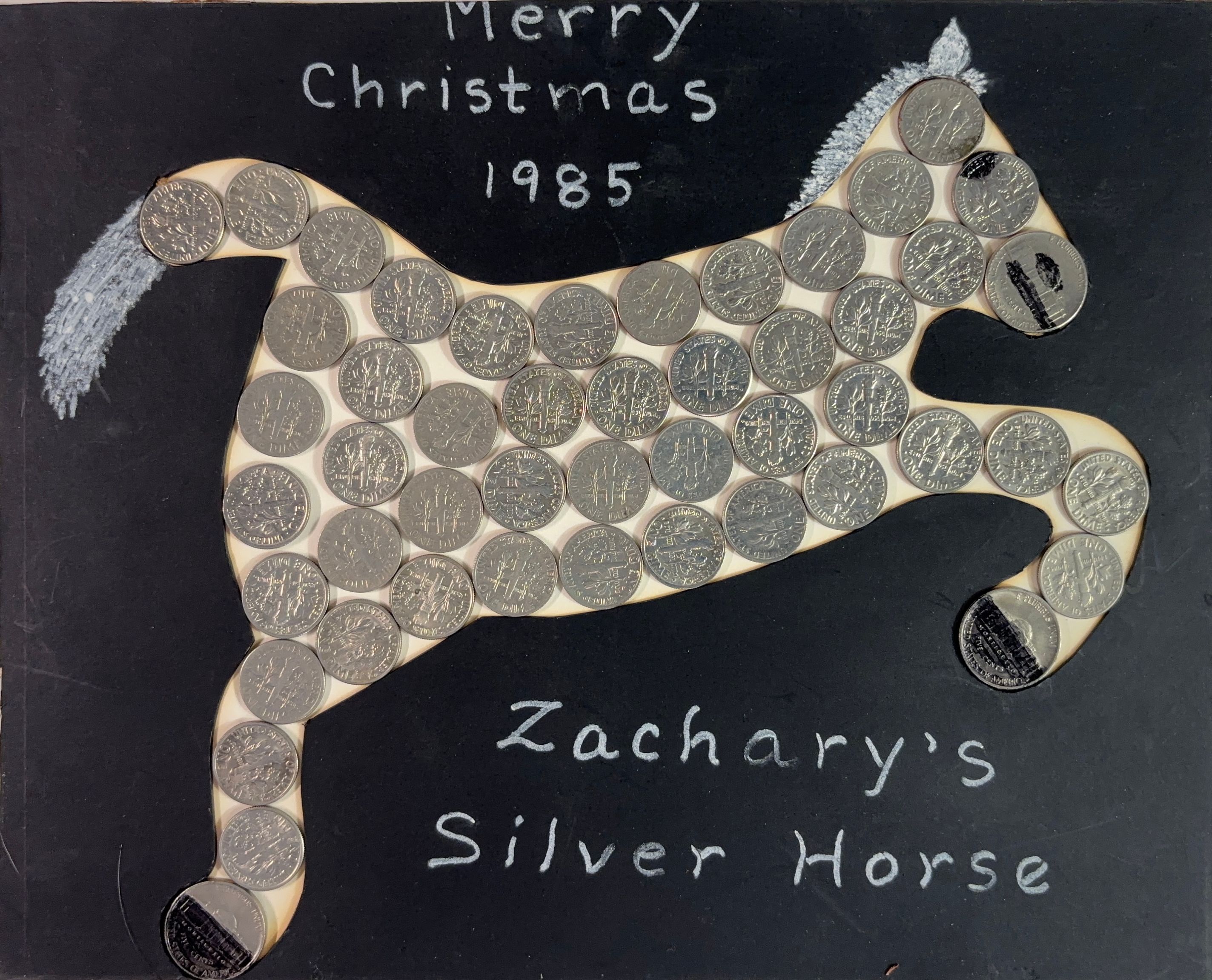 A silver horse made of US Coins