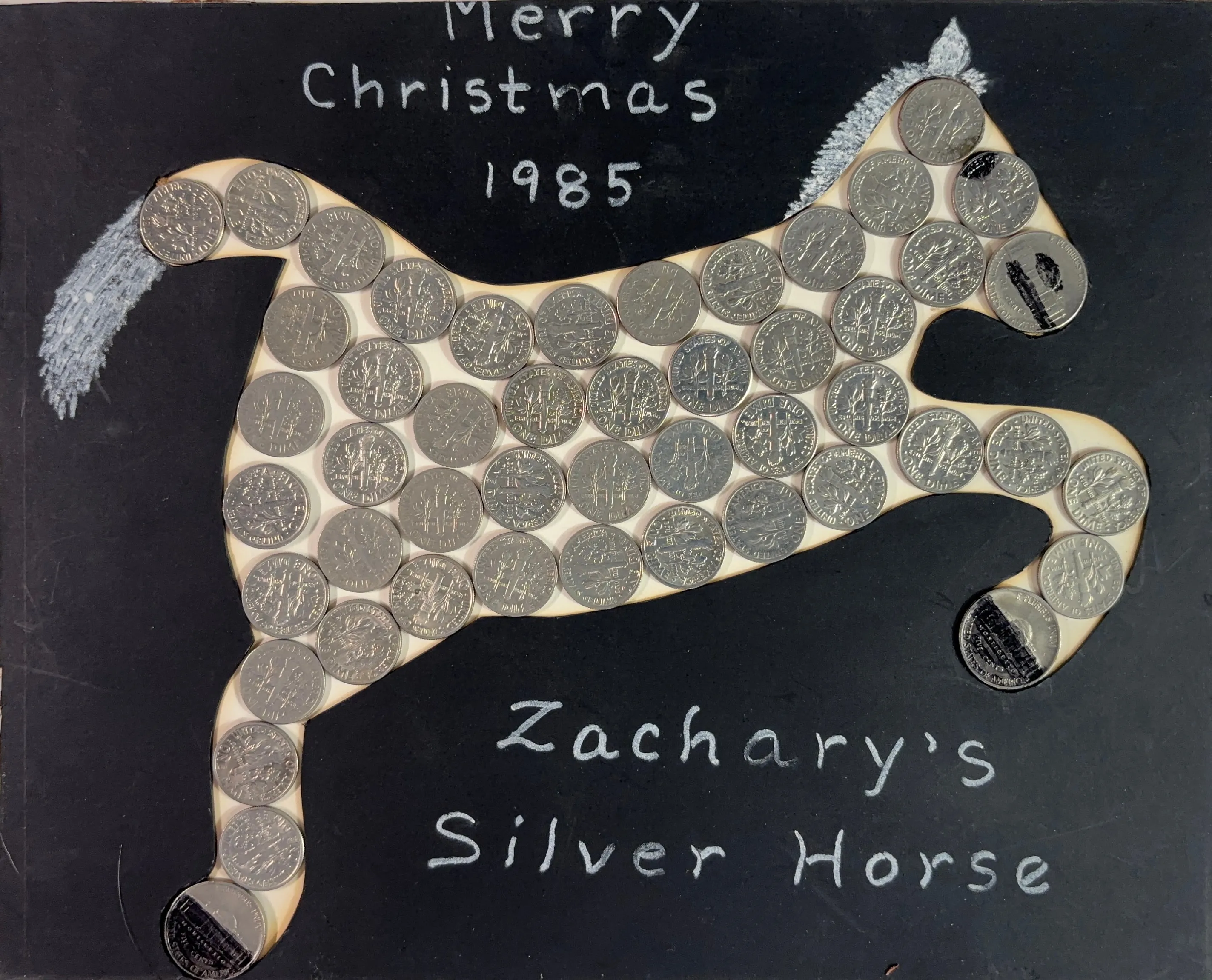 A silver horse made of US Coins